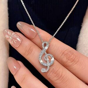 Anthropologie Silver Treble Clef Pendant Necklace